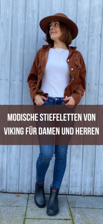 Gummistiefeletten von Viking und kurze Schafthöhe Frau mit Hut und Gummistiefelette von Viking vor grauem Tor